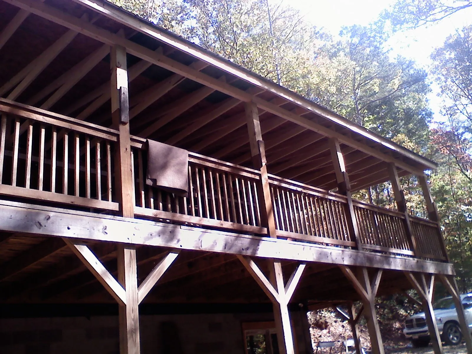 Timber framing under a new elevated porch and deck — Roof Leak Repair in Saint James City by Roofing Brothers